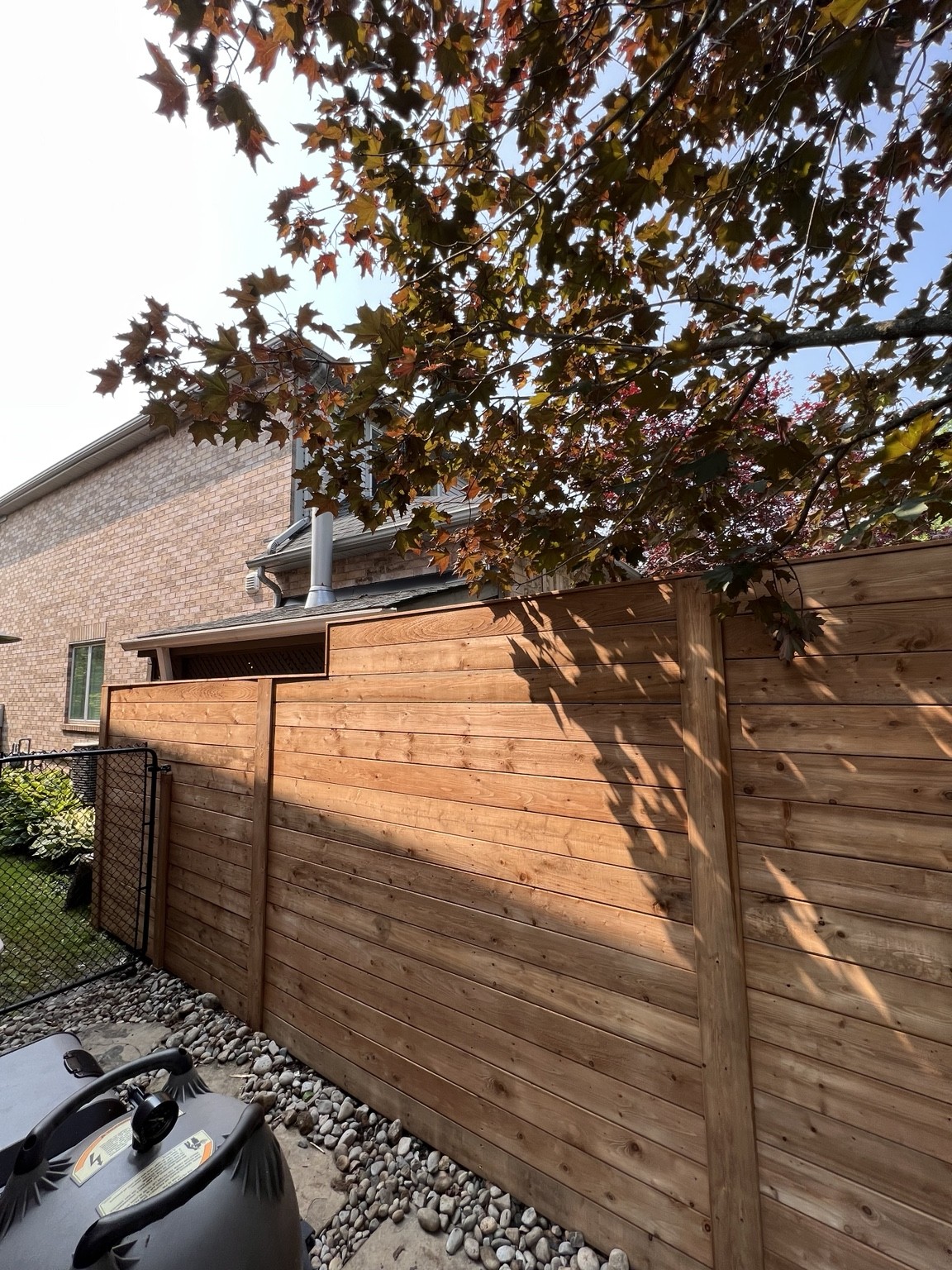 Horizontal wood fencing with clean lines and a warm finish.