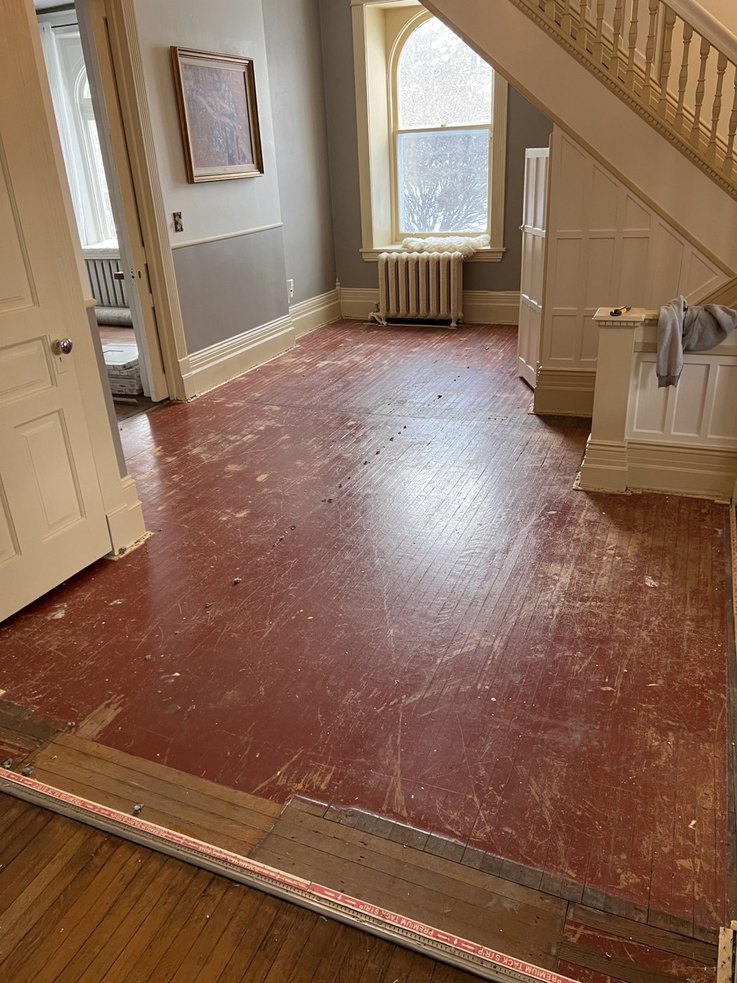 Marble flooring, trim & paint — Before